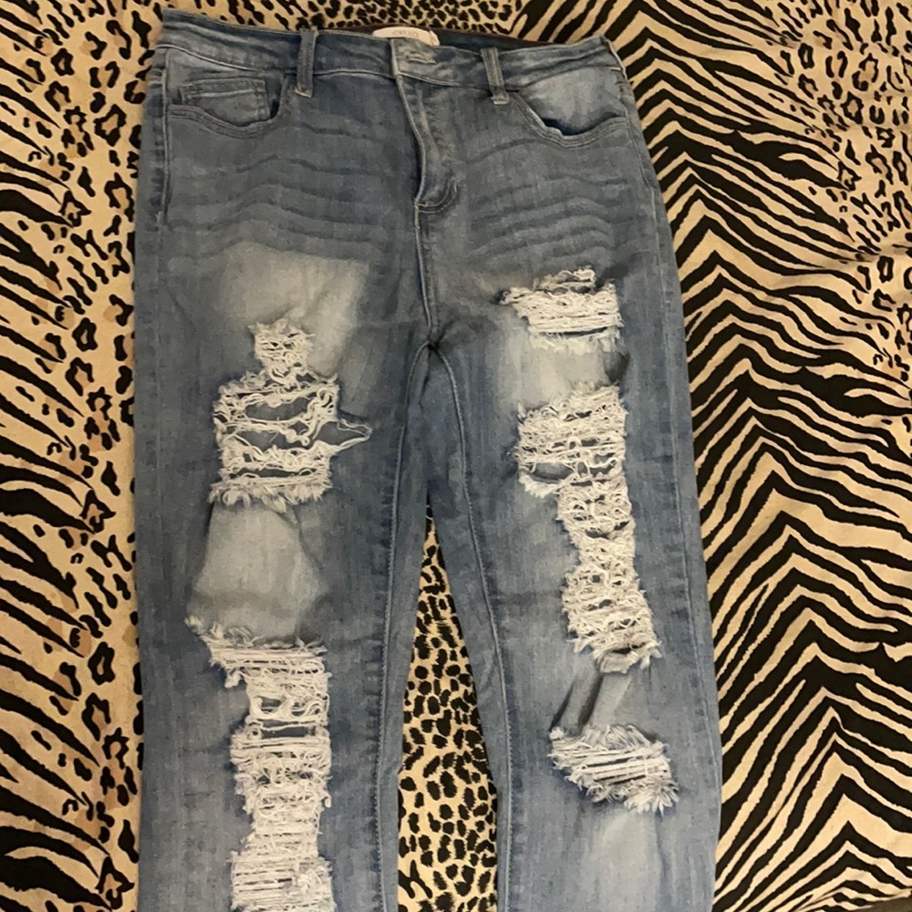 Distressed Blue Jeans